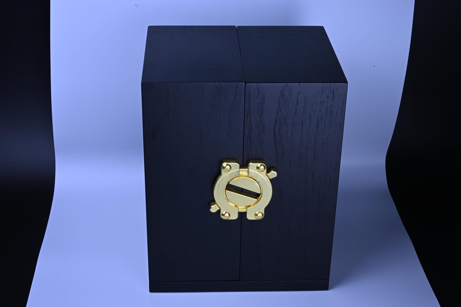 Wooden presentation case with brushed-gold latch, front view